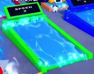 Green SPEED 2 treadmill with a glowing blue training surface.